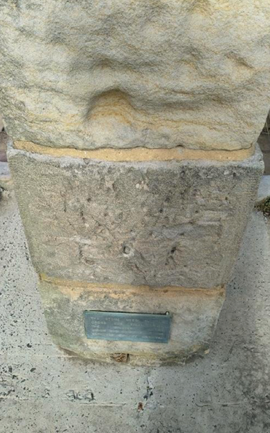 A close up of a stone building

Description automatically generated